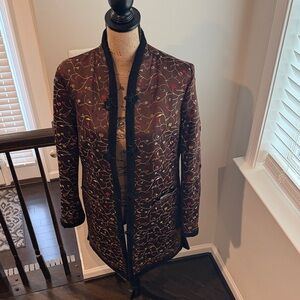 Jenni Max Brown Floral Silk Jacket

Size is 10 but fits like a small